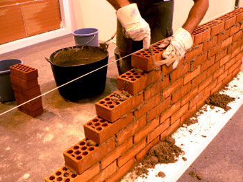 Handyman laying brick